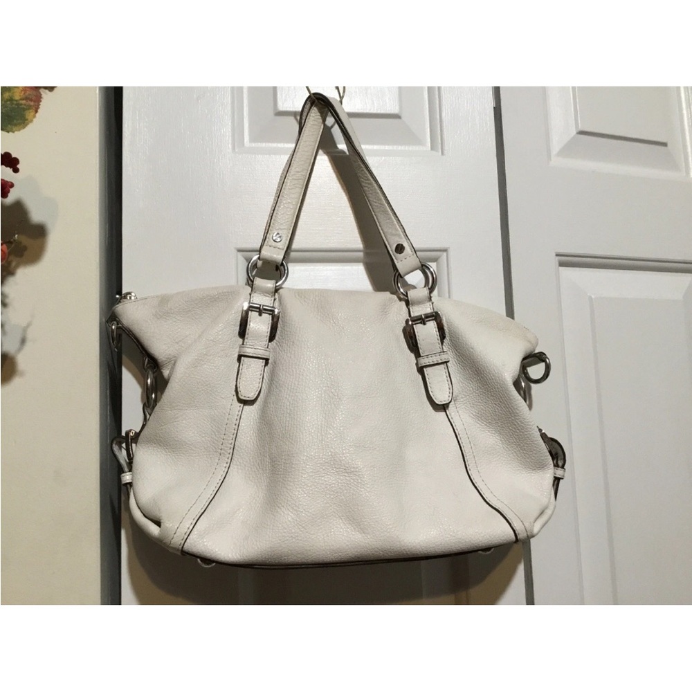 Michael KOR’s White Leather Side Pocket Zipper Purse